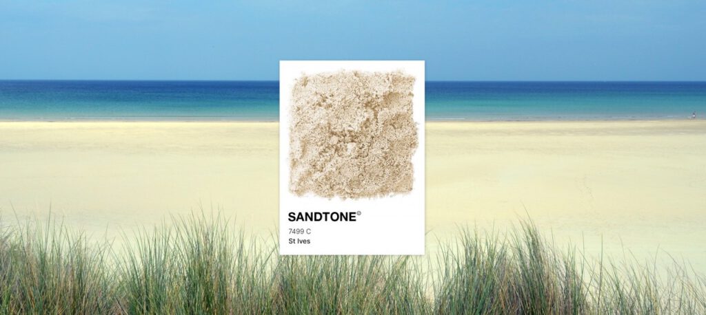 Picture of a beach with a card highlighting the colour of the sand
